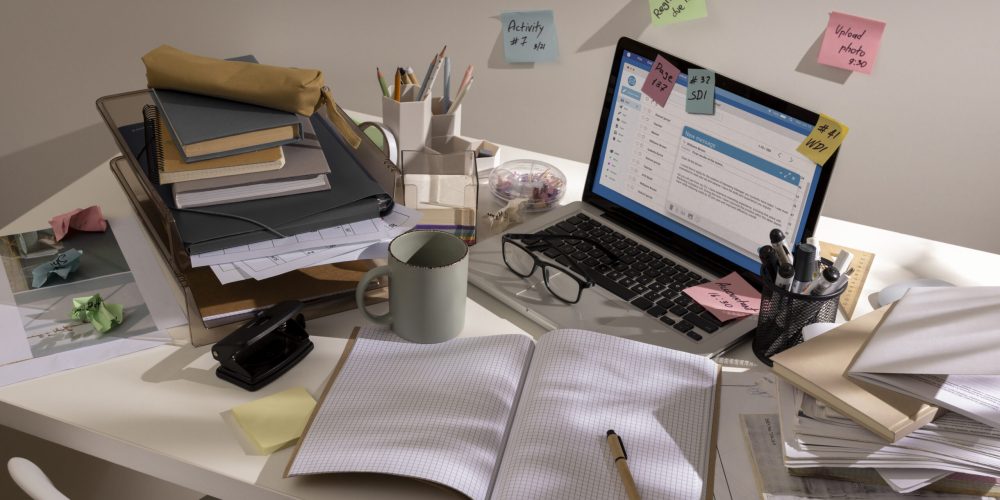 view-messy-office-workspace-with-laptop